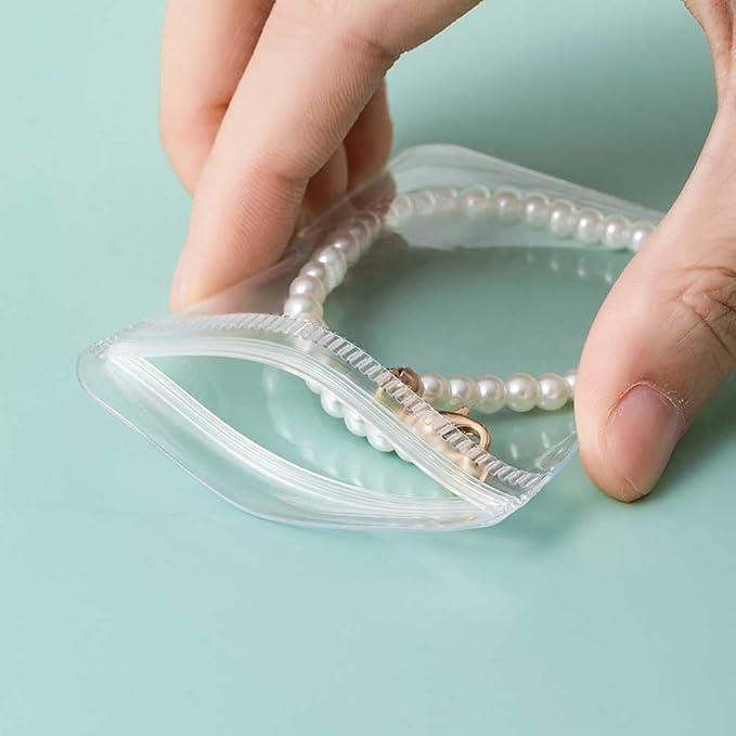 1 Pc Transparent Jewelry Storage Book 84 Pockets Jewelry Album Portable Travel Jewelry Organizer with 60 Pcs Small Clear Plastic Bags for Rings, Necklaces, Bracelets, Studs, Earrings, Brooches - Image 5