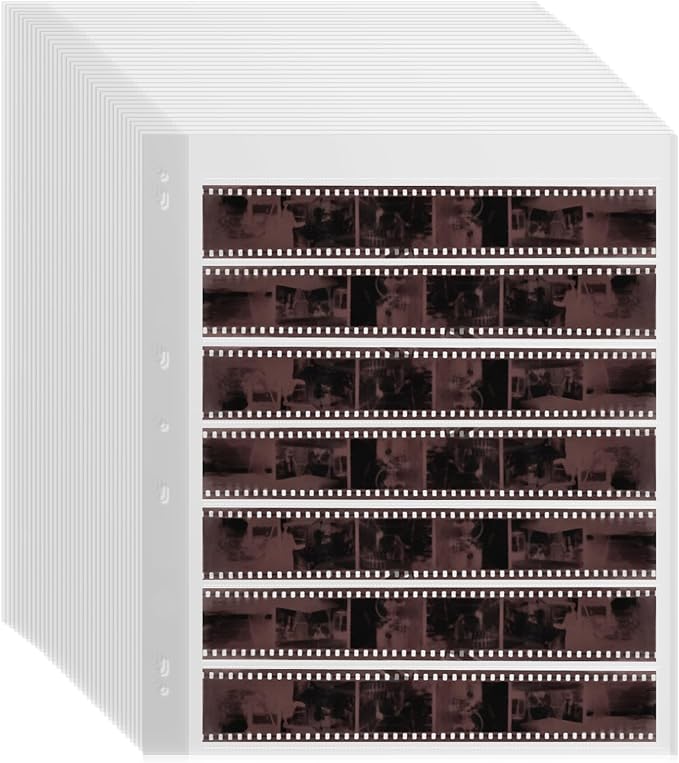 100 Pcs 35mm Film Negative Sleeves Film Negative Storage Presentation Materials 35mm Size Negative Pages Holds Seven Strips of Six Frames Help You Collect and Organize Film by KDIMSY