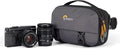 Lowepro Trekker Lite Hp 100, Compact Camera Backpack with Tablet Pocket, Camera Bag for Crop-Sensor Mirrorless, Ultracinch Compression System, Grey by Lowepro